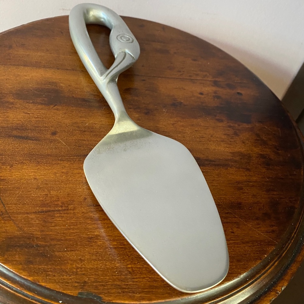Vintage Ilana Goor signed aluminum bird head neck and beak cake server